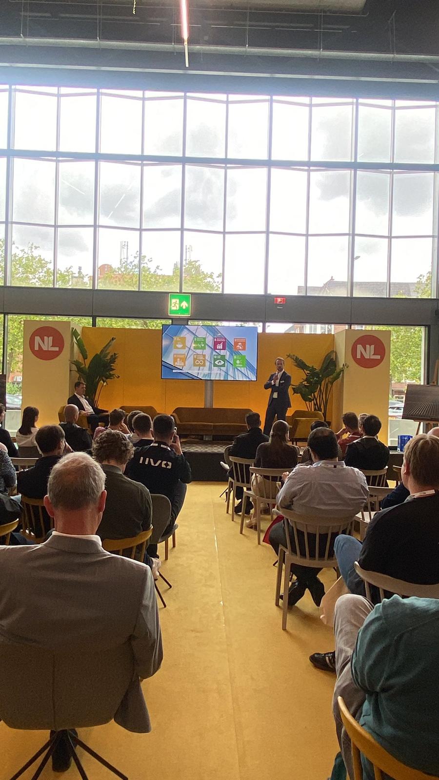 Audience listening to a presentation by KUBO at the Rai in Amsterdam